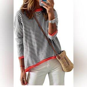 Black and White Striped Sweater with Red Accents